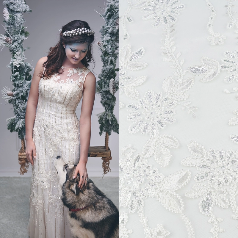 KORS100.365 | Spitzenstoff mit Pailletten, Blumen und Bogenkante weiß - 2